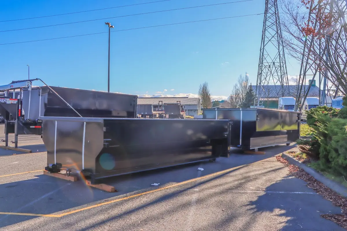 Roll-off dumpster ready for waste disposal at job site for Commercial Dumpster Rental in New Iberia
